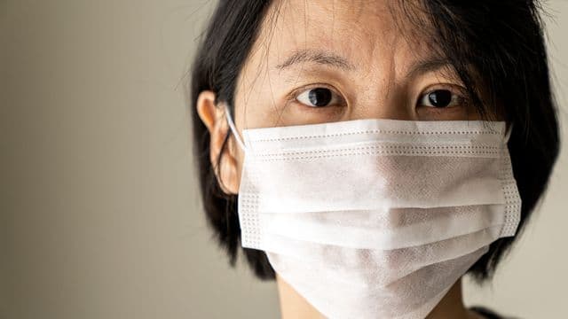 photodune-roFaMIPj-china-woman-wear-medical-mask-protection-from-flu-virus-xxl-scaled.jpg